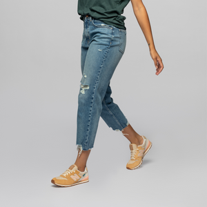 The model is 5'8", weighs 138 lbs and is wearing her true size 27.