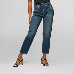 The model is 5'6" and weighs 127 lbs. She is wearing her true size 26.